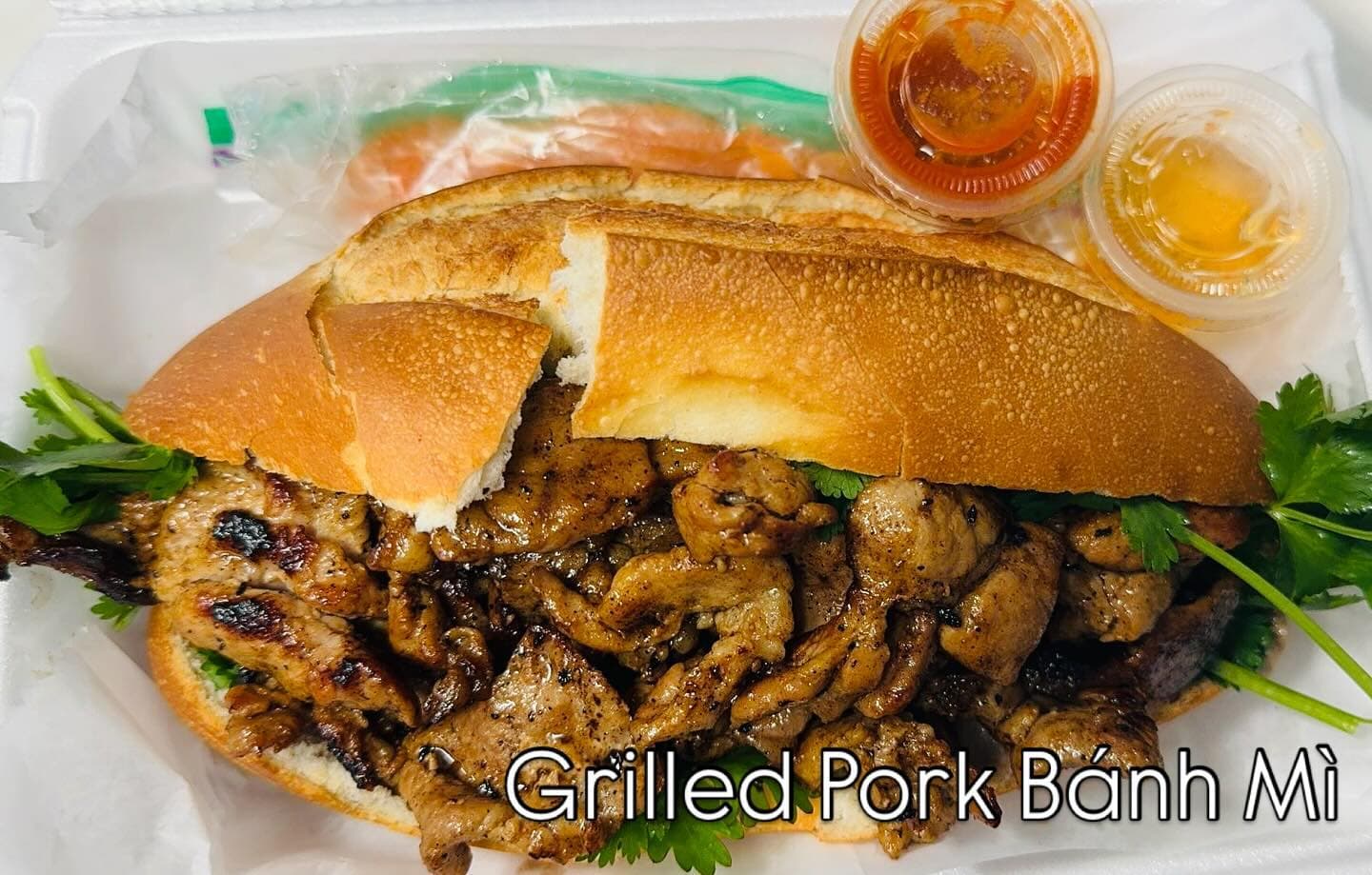 Grilled pork bánh mì on a crispy baguette